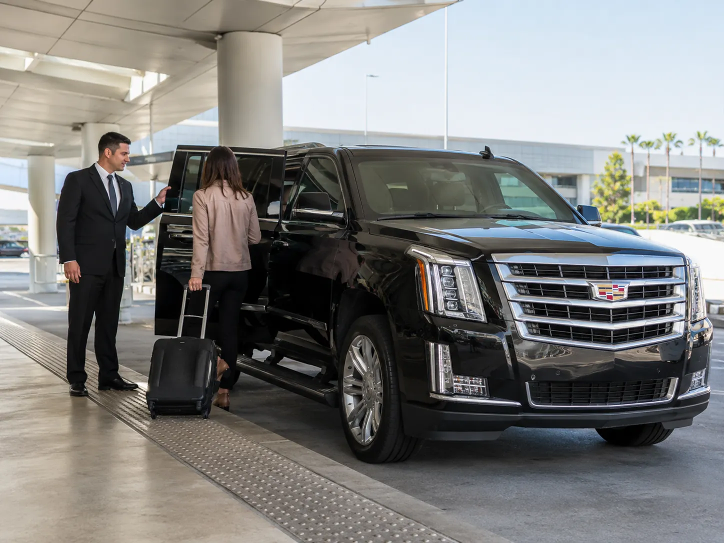 Cadillac Escalade airport pickup for Redlands to LAX private car service