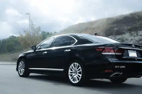 Black Lexus sedan for point-to-point transportation in Redlands